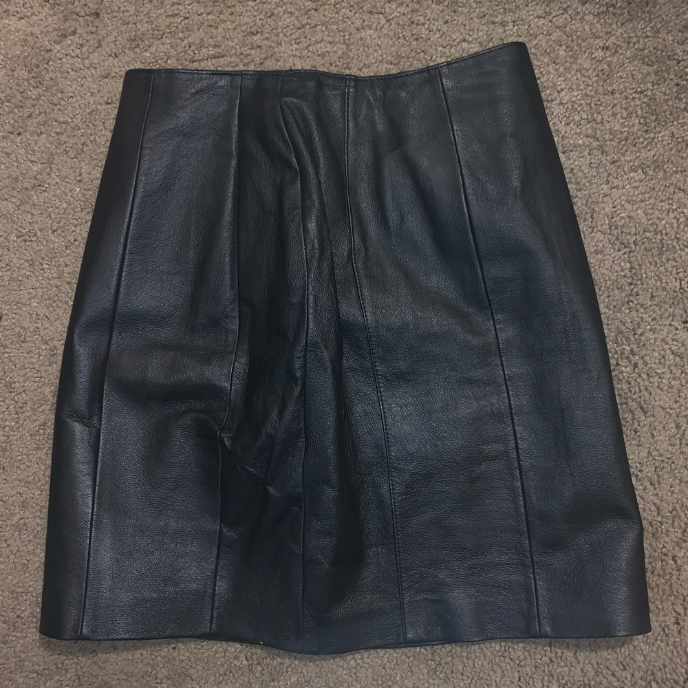 Leather skirt.